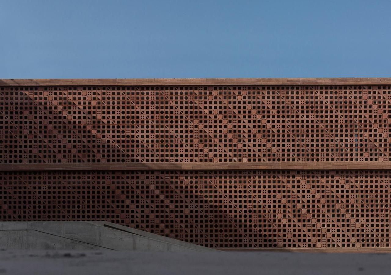 Potato Head Suites & Studios Seminyak Eksteriør bilde The perforated brick facade
